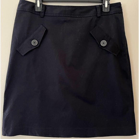 DANA BUCHMAN Women’s Black Mini Skirt. 4 Mock Pockets. Side Zip. Size 10 - Picture 1 of 7